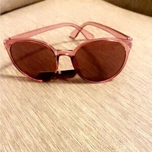 Trendy pink sunglasses. Super cute and stylish. 100%UVB protection .